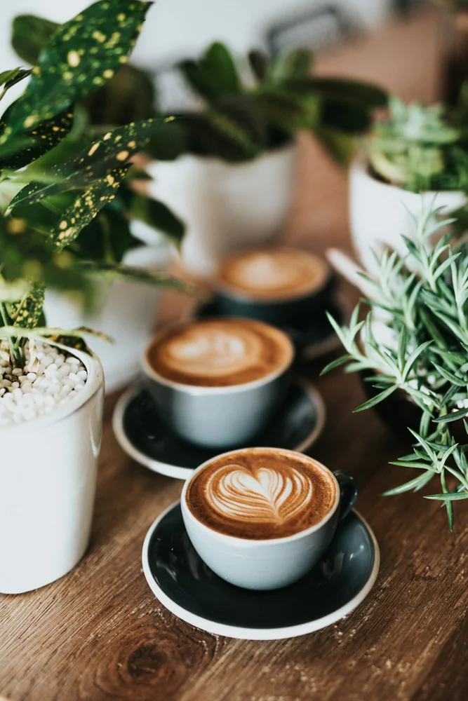 Cups of coffee on a table